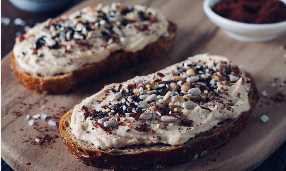 Vegan toast ideas with hummus and seeds